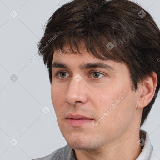 Neutral white adult male with short  brown hair and brown eyes