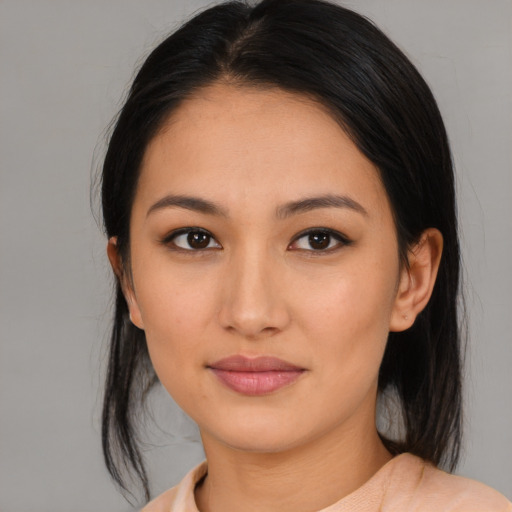 Neutral asian young-adult female with medium  black hair and brown eyes