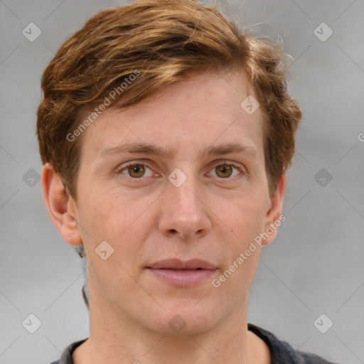 Joyful white adult male with short  brown hair and grey eyes