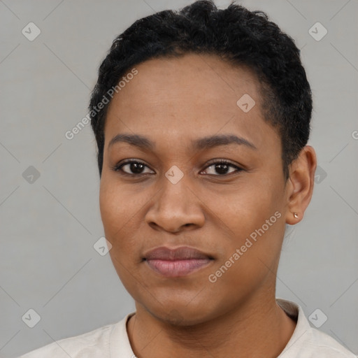 Joyful black young-adult female with short  black hair and brown eyes