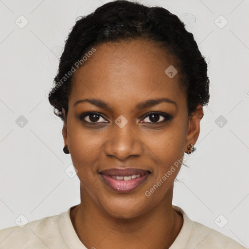 Joyful black young-adult female with short  black hair and brown eyes