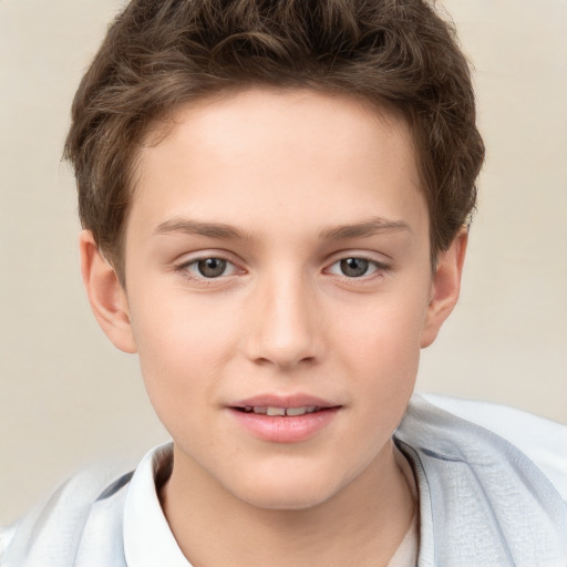 Joyful white child male with short  brown hair and brown eyes