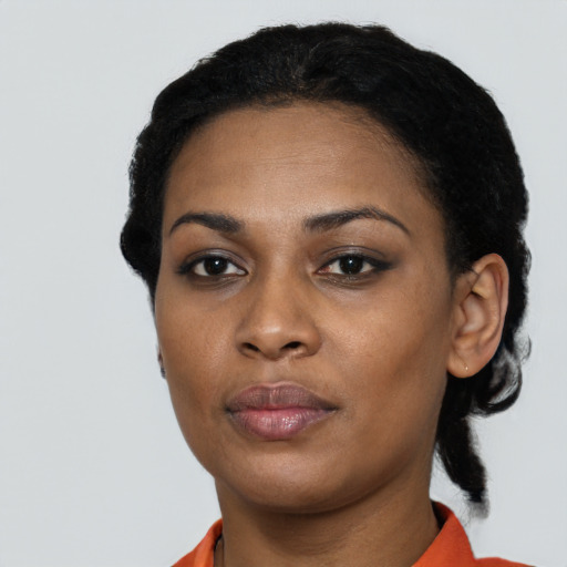 Neutral black young-adult female with short  black hair and brown eyes