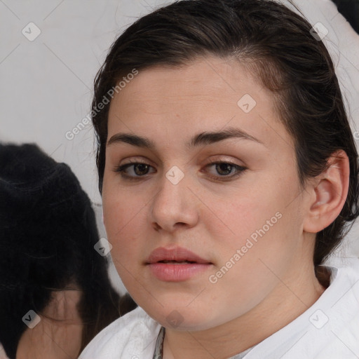 Neutral white young-adult female with medium  brown hair and brown eyes