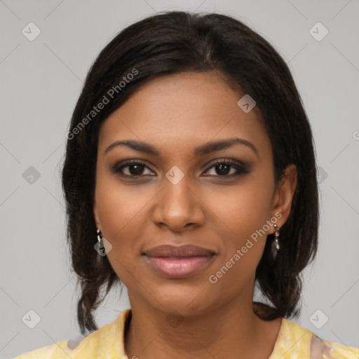 Joyful black young-adult female with medium  brown hair and brown eyes