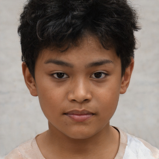 Neutral latino child male with short  brown hair and brown eyes