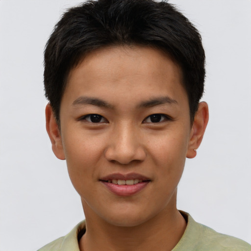 Joyful asian young-adult female with short  brown hair and brown eyes