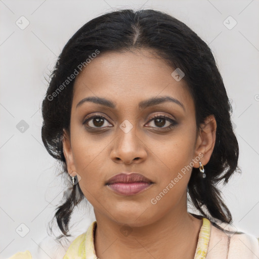 Joyful latino young-adult female with medium  brown hair and brown eyes