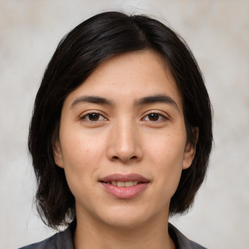 Joyful white young-adult female with medium  black hair and brown eyes