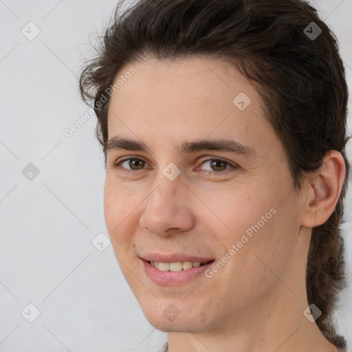 Joyful white young-adult male with medium  brown hair and brown eyes