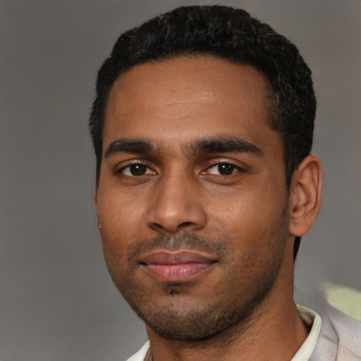 Neutral latino young-adult male with short  black hair and brown eyes
