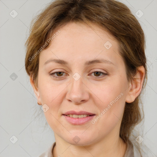 Joyful white adult female with medium  brown hair and grey eyes