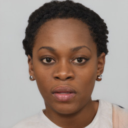 Neutral black young-adult female with short  black hair and brown eyes