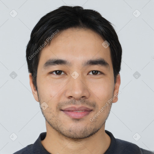 Joyful asian young-adult male with short  black hair and brown eyes