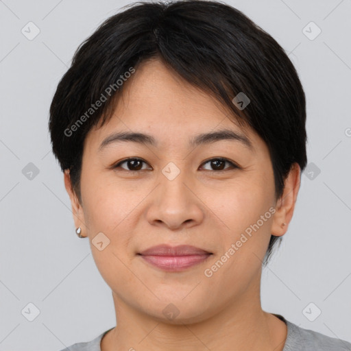 Joyful asian young-adult female with short  brown hair and brown eyes