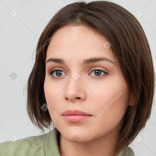 Neutral white young-adult female with medium  brown hair and brown eyes