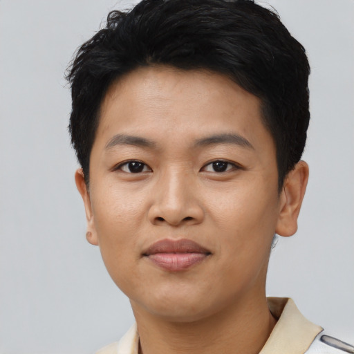 Joyful asian young-adult female with short  black hair and brown eyes