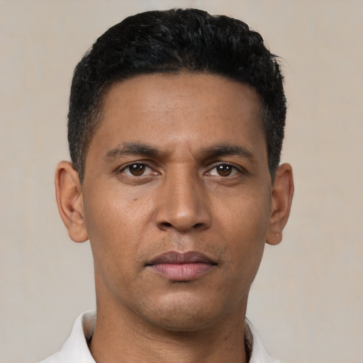 Neutral latino young-adult male with short  black hair and brown eyes