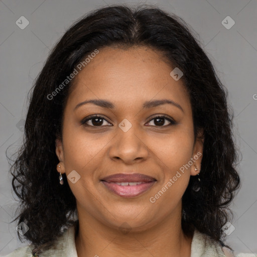 Joyful black young-adult female with medium  brown hair and brown eyes