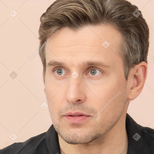 Neutral white adult male with short  brown hair and brown eyes