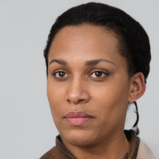 Neutral black young-adult female with short  black hair and brown eyes