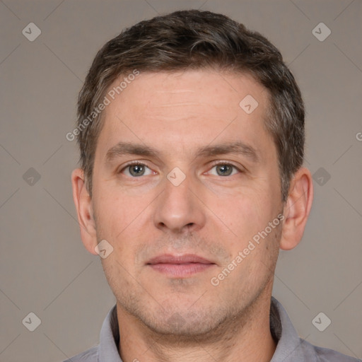 Neutral white adult male with short  brown hair and brown eyes