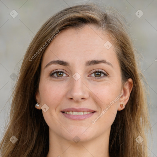 Joyful white young-adult female with long  brown hair and green eyes