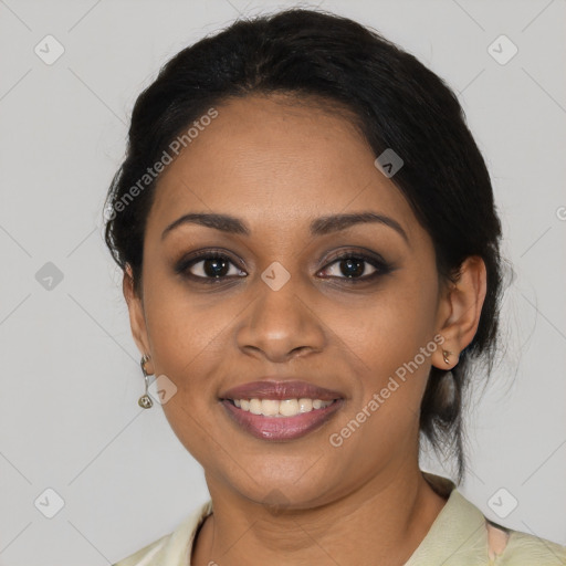 Joyful black young-adult female with medium  black hair and brown eyes