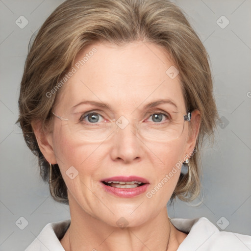 Joyful white adult female with medium  brown hair and blue eyes