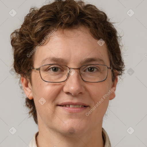 Joyful white adult female with short  brown hair and grey eyes