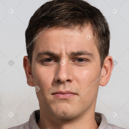 Neutral white young-adult male with short  brown hair and grey eyes