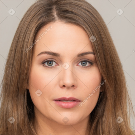 Neutral white young-adult female with long  brown hair and brown eyes