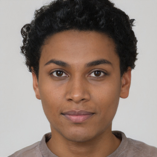 Neutral black young-adult female with short  black hair and brown eyes