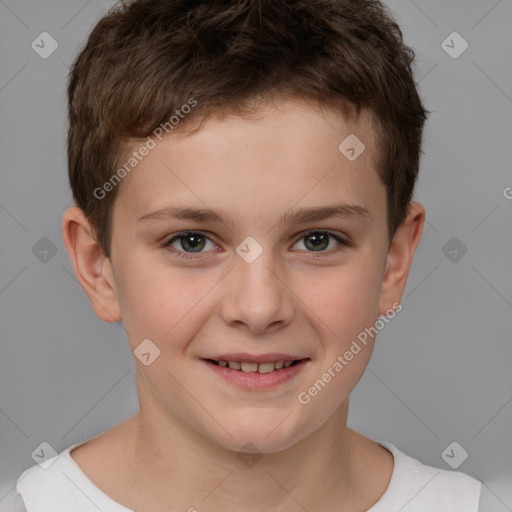 Joyful white child male with short  brown hair and brown eyes