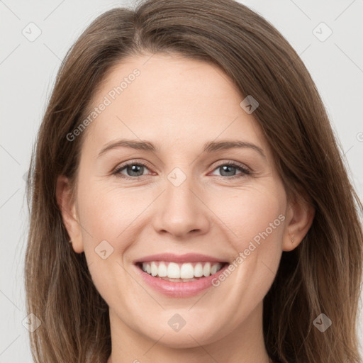 Joyful white young-adult female with long  brown hair and grey eyes