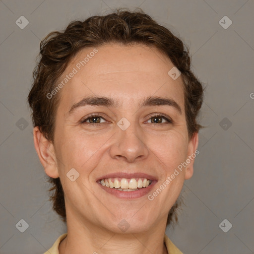 Joyful white adult female with short  brown hair and brown eyes