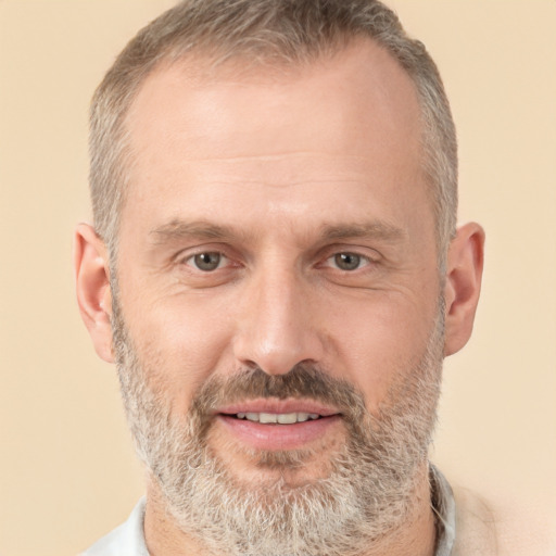 Joyful white middle-aged male with short  brown hair and brown eyes