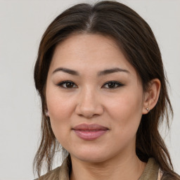 Joyful white young-adult female with medium  brown hair and brown eyes