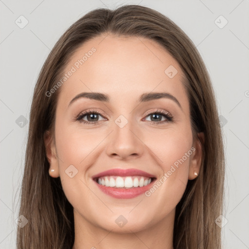 Joyful white young-adult female with long  brown hair and grey eyes