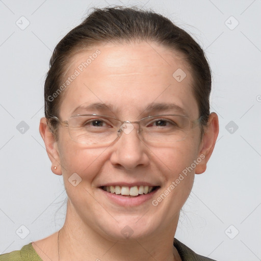 Joyful white adult female with short  brown hair and grey eyes