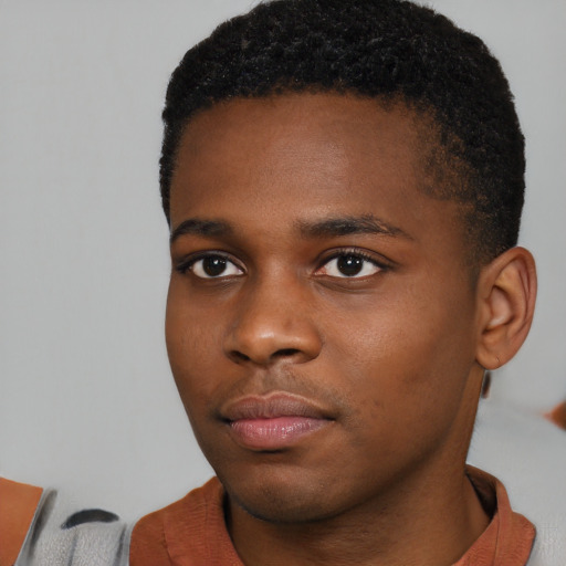 Neutral black young-adult male with short  brown hair and brown eyes