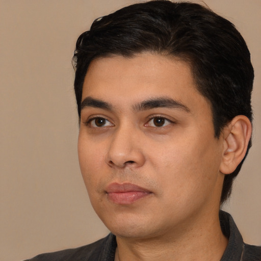 Neutral white young-adult male with short  black hair and brown eyes