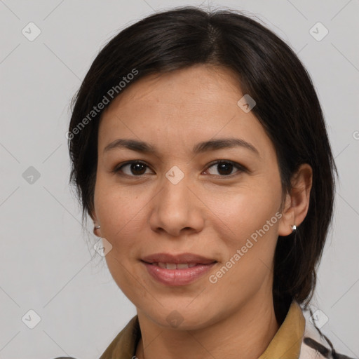 Joyful white adult female with medium  brown hair and brown eyes