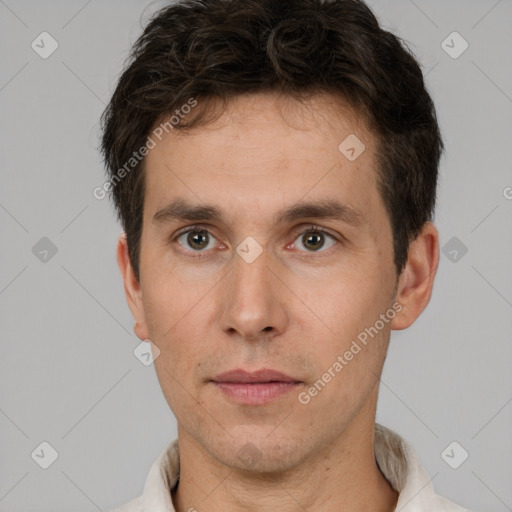 Neutral white young-adult male with short  brown hair and brown eyes