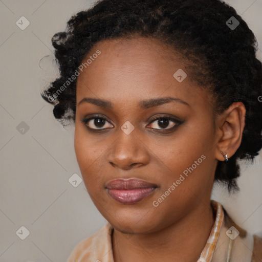 Joyful black young-adult female with medium  black hair and brown eyes