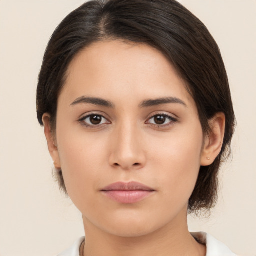 Neutral white young-adult female with medium  brown hair and brown eyes