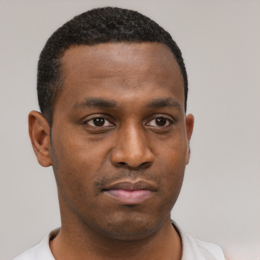 Neutral black young-adult male with short  black hair and brown eyes