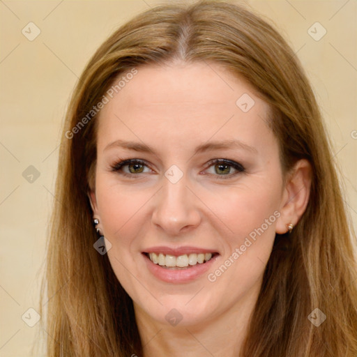 Joyful white young-adult female with long  brown hair and green eyes