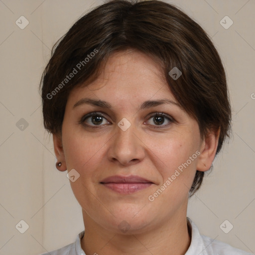 Joyful white adult female with medium  brown hair and brown eyes