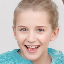 Joyful white child female with short  brown hair and blue eyes